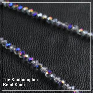Chinese 2.5x3mm Rondelle Crystals - Grey with Half Purple Coat